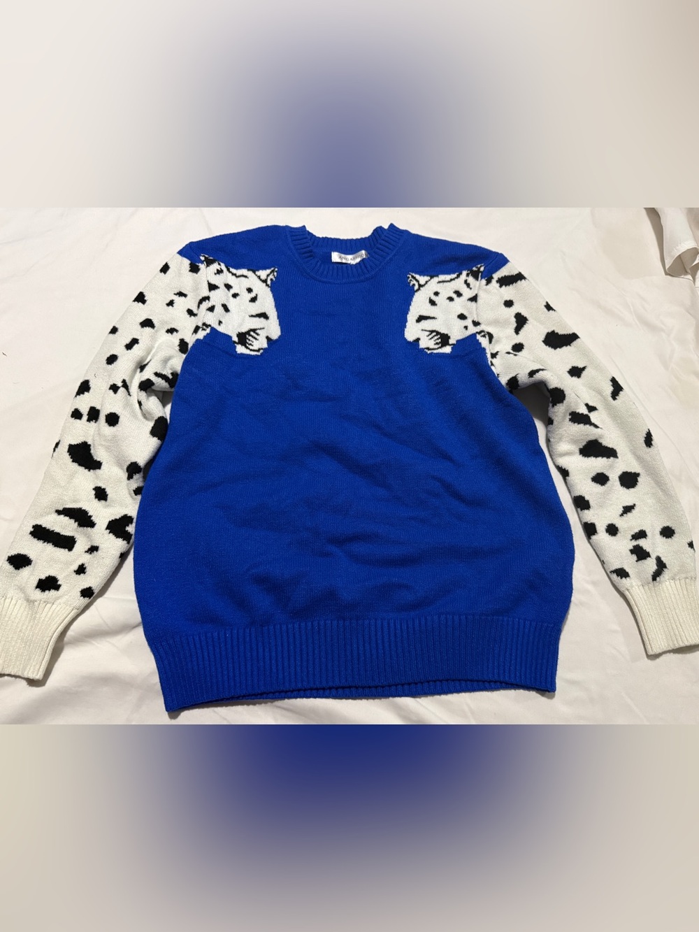 Bright Blue Crewneck Sweater with Animal-Accent Sleeves
